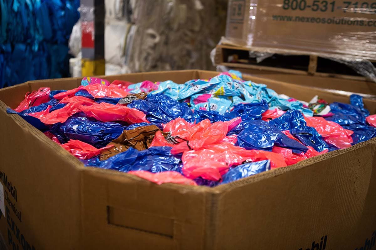 Recovered paper being moved through a recycling facility